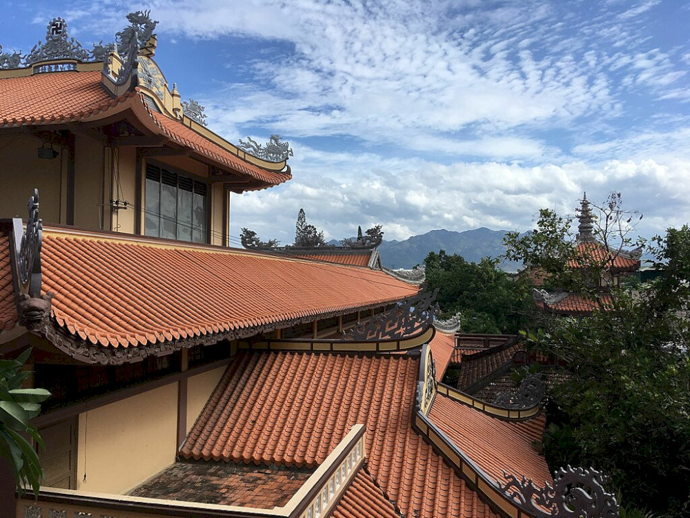 The roof of the pagoda is exquisitely carved with Buddhist architecture